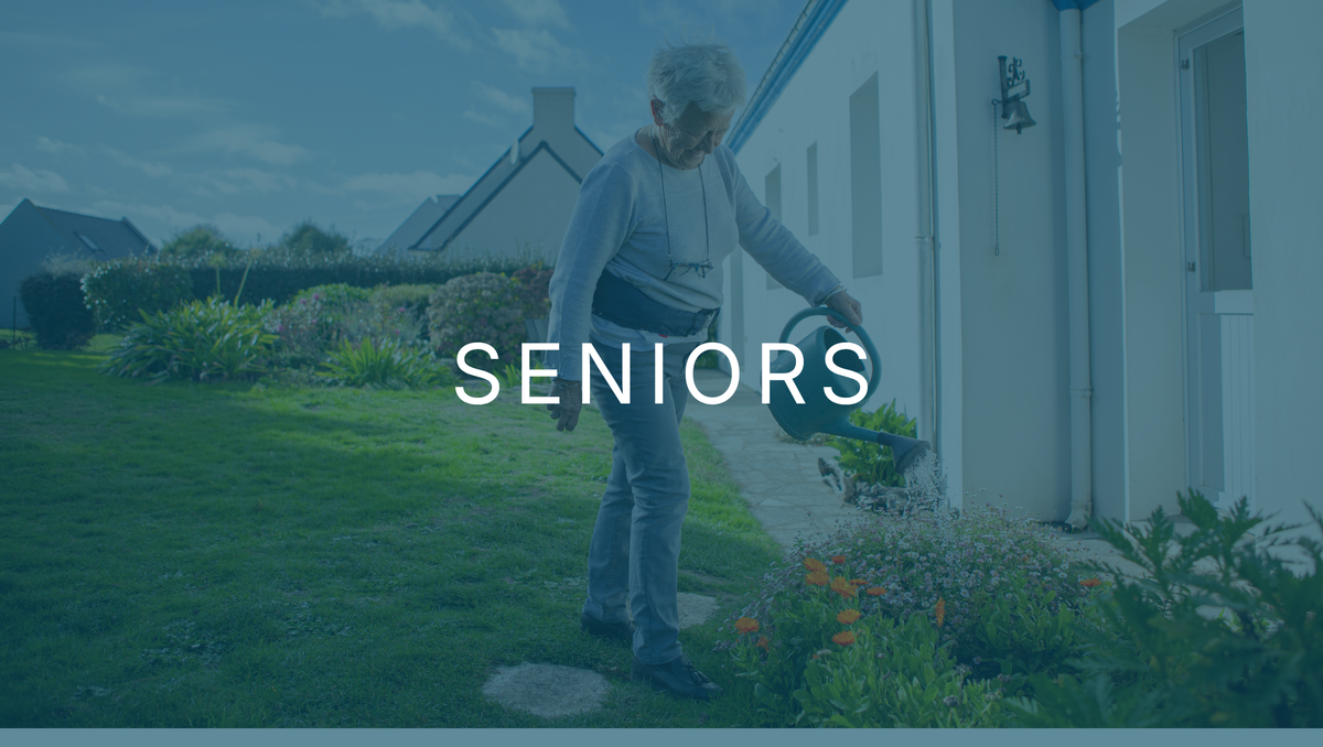 Older woman gardening outside her home wearing a Helite Hip'Guard airbag belt