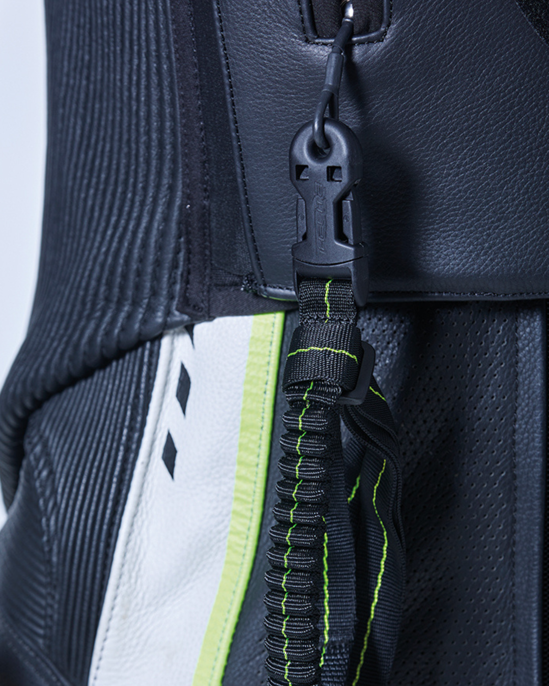 Close-up of the GP Air vest zip running down the side of a race suit