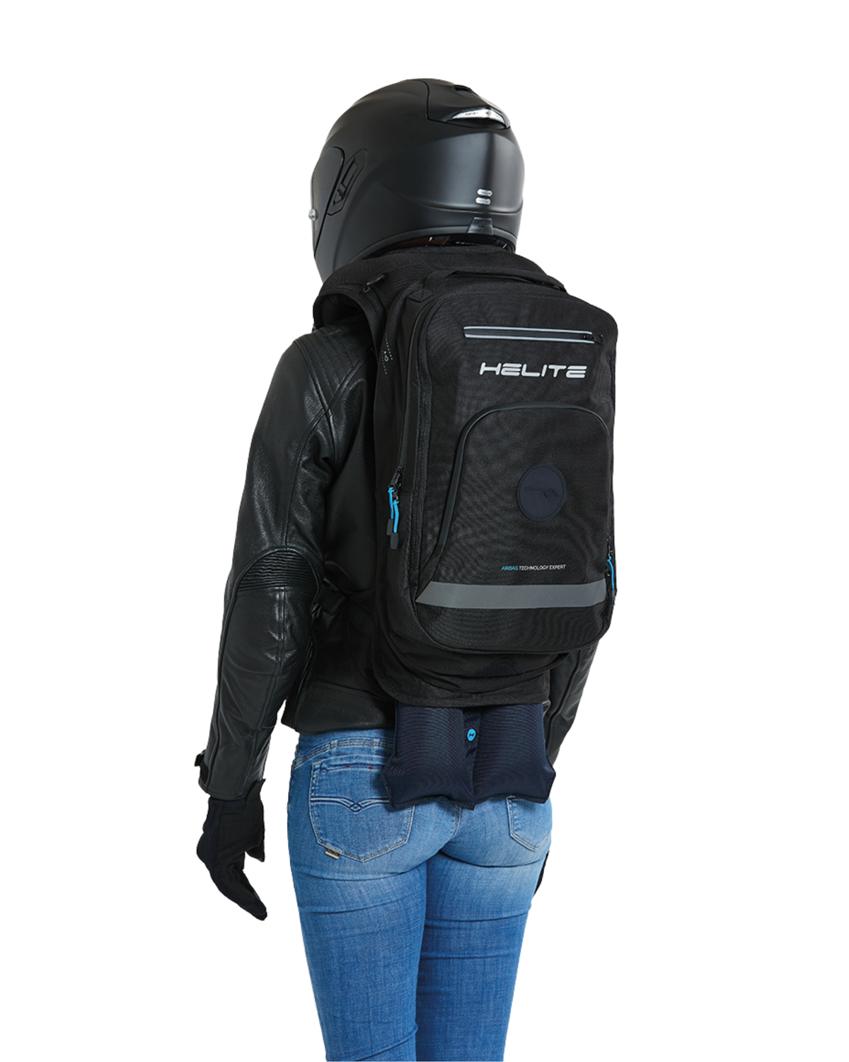 Rider in a helmet wearing the H-Moov electronic airbag backpack, seen from behind