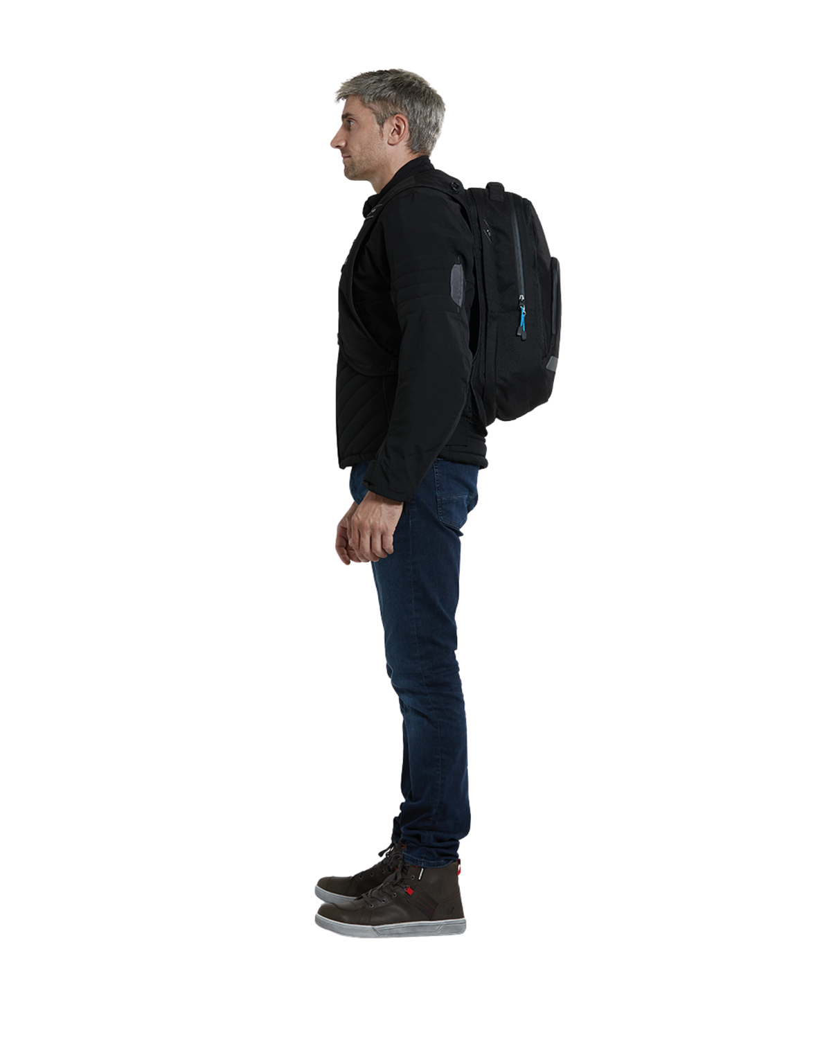 Side view of a man wearing the Helite H-Moov airbag backpack