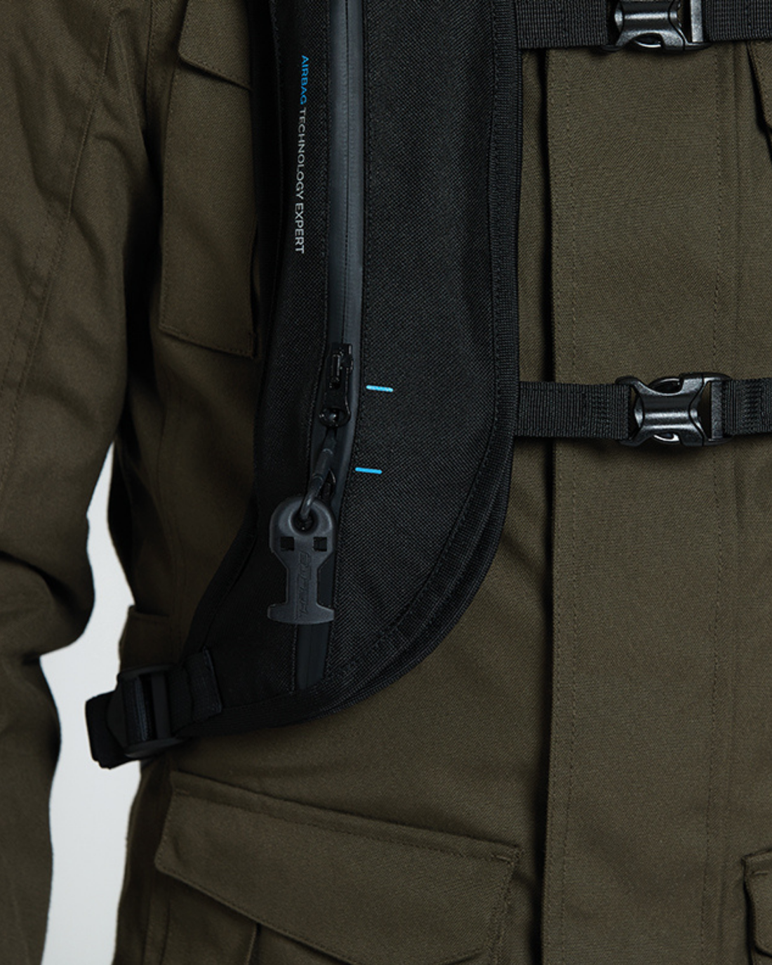 Close-up of the H-Moov backpack chest strap and mechanical lanyard connector