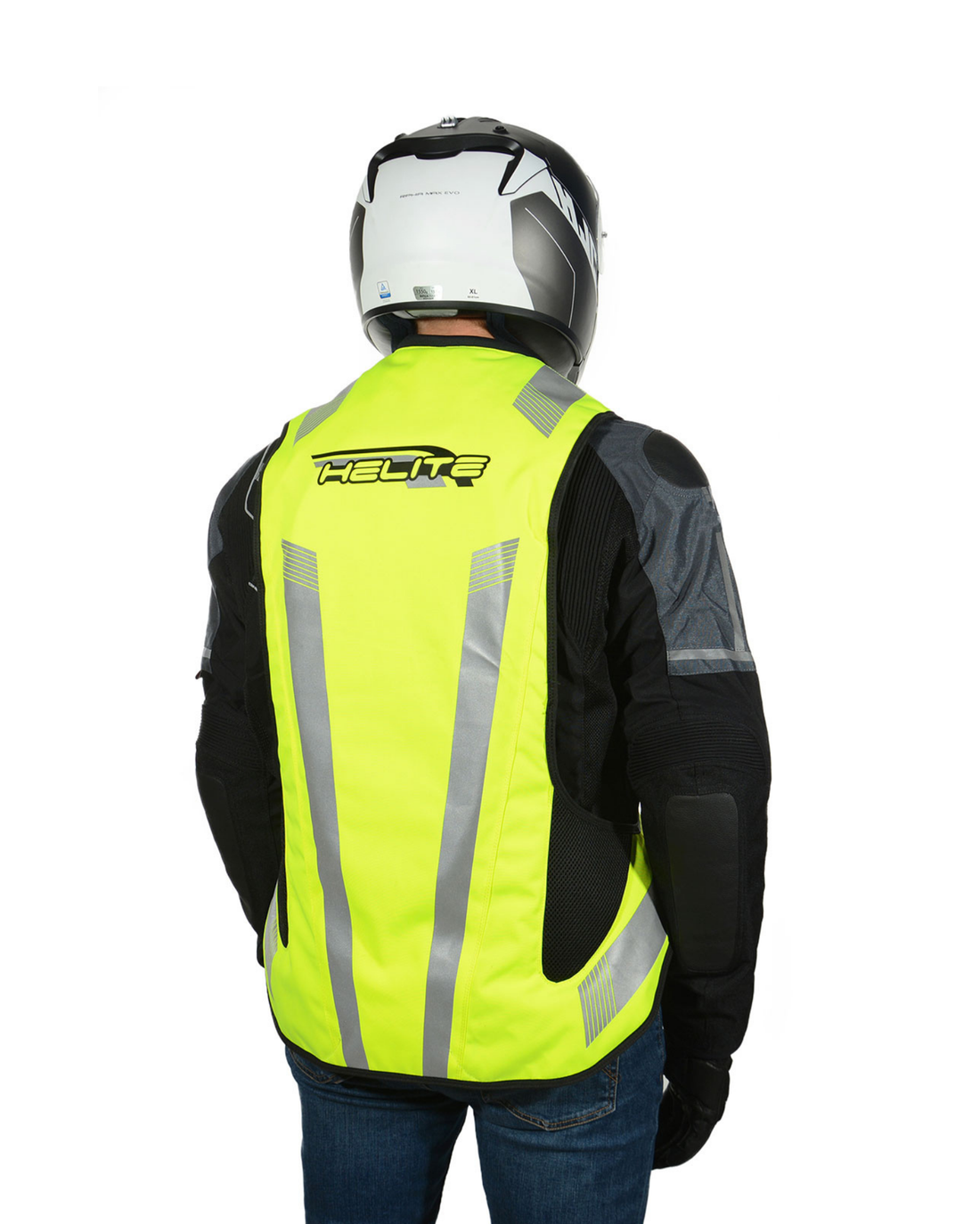 Rear view of a rider wearing the high-vis Turtle 2 airbag vest, Helite logo across the back