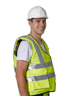 Side view of a smiling worker in a hard hat and yellow hi-vis vest wearing the Air'Fall airbag underneath