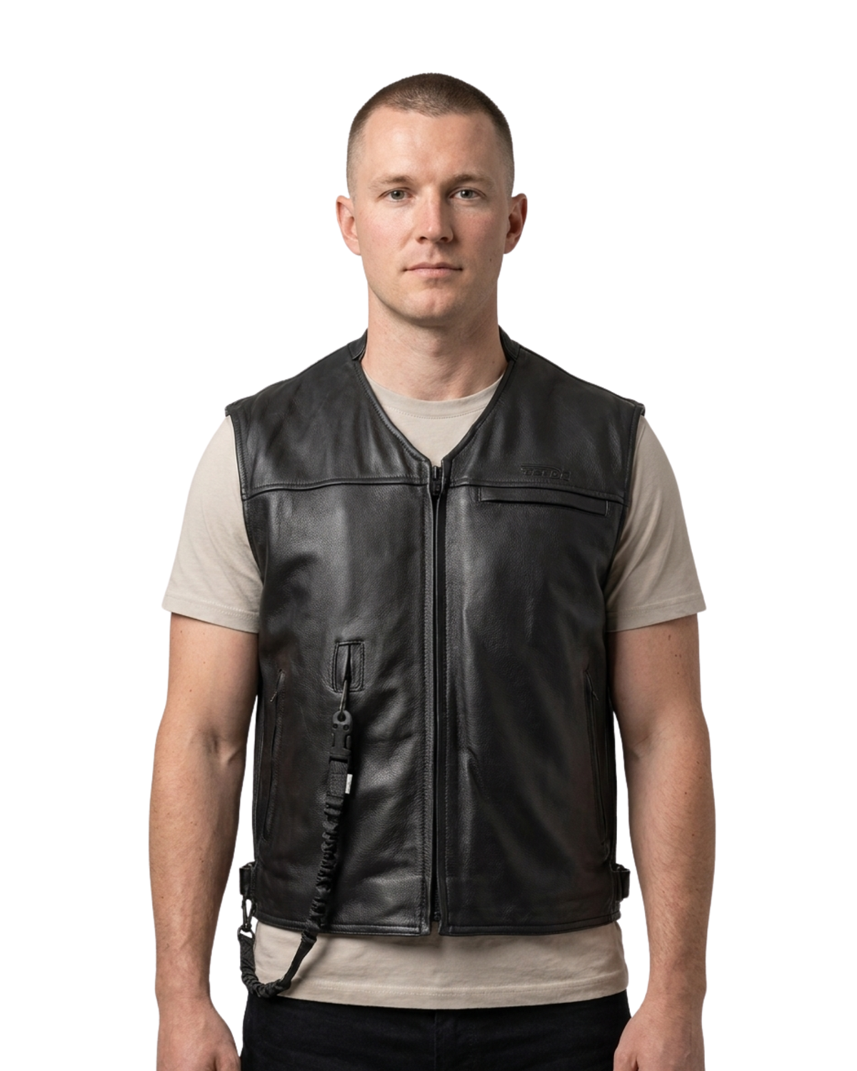 Man wearing the custom Helite leather airbag vest in black over a T-shirt, front view with the lanyard hanging at the front