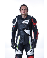 Racer in leathers wearing the Helite e-GP Air electronic airbag vest