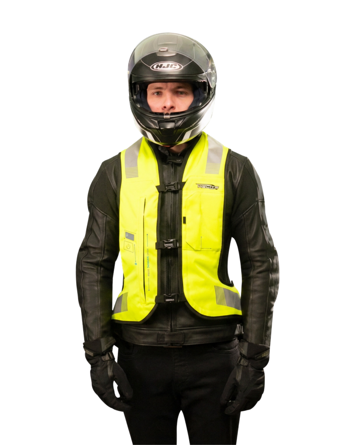 Rider in a full-face helmet wearing the high-vis e-Turtle airbag vest over a leather jacket