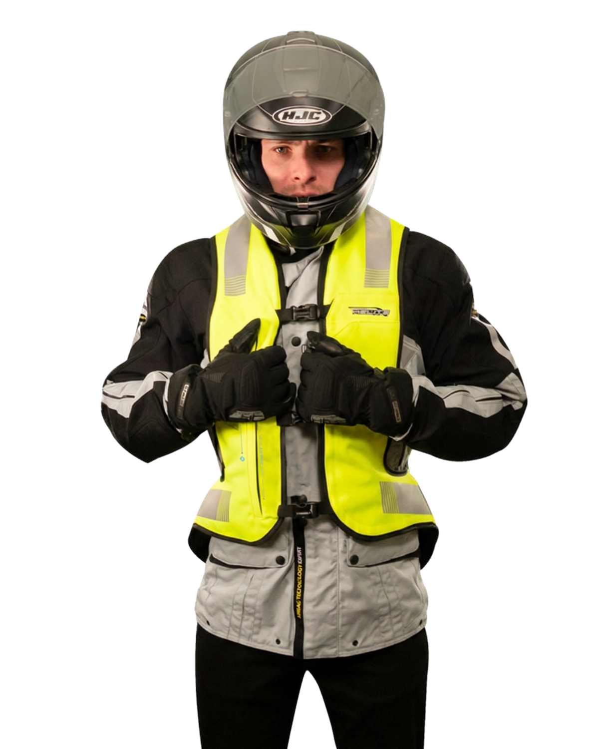 Rider in gloves adjusting the front of the high-vis e-Turtle airbag vest