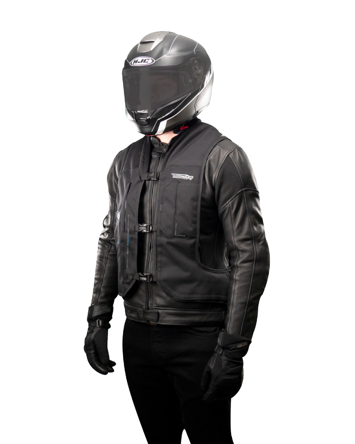 Rider in a leather jacket wearing the black e-Turtle electronic airbag vest