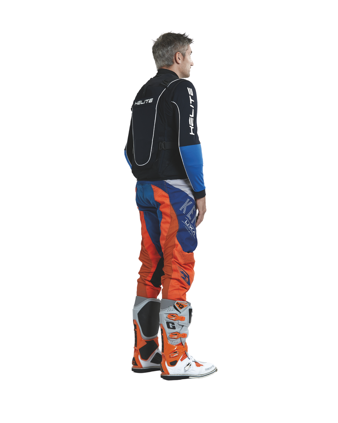 Rear three-quarter view of a rider wearing the Helite Off Road airbag vest