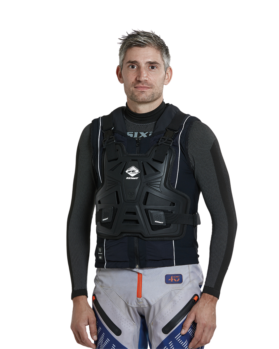 Rider wearing the Helite Off Road airbag vest without sleeves over a base layer