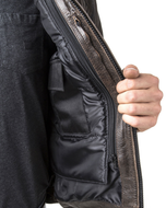 Hand holding open the Roadster jacket to show the airbag and inner lining