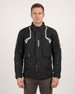 Man wearing the black Helite Touring airbag jacket, front view on a plain background